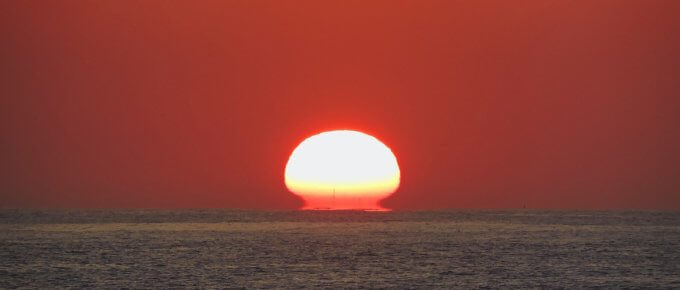 silhouette of mountain during sunset